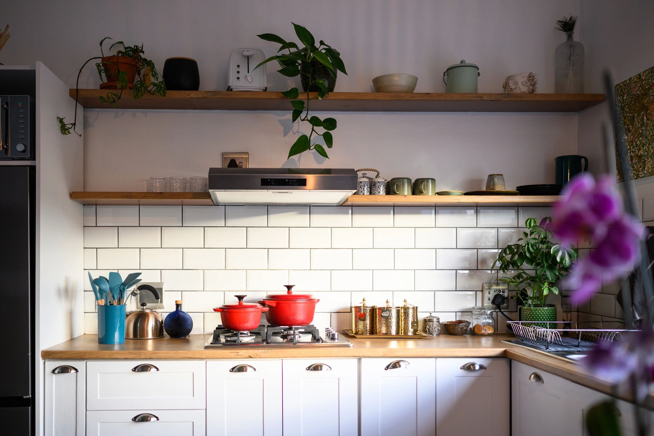 Bright kitchen with custom cabinets and finished countertops