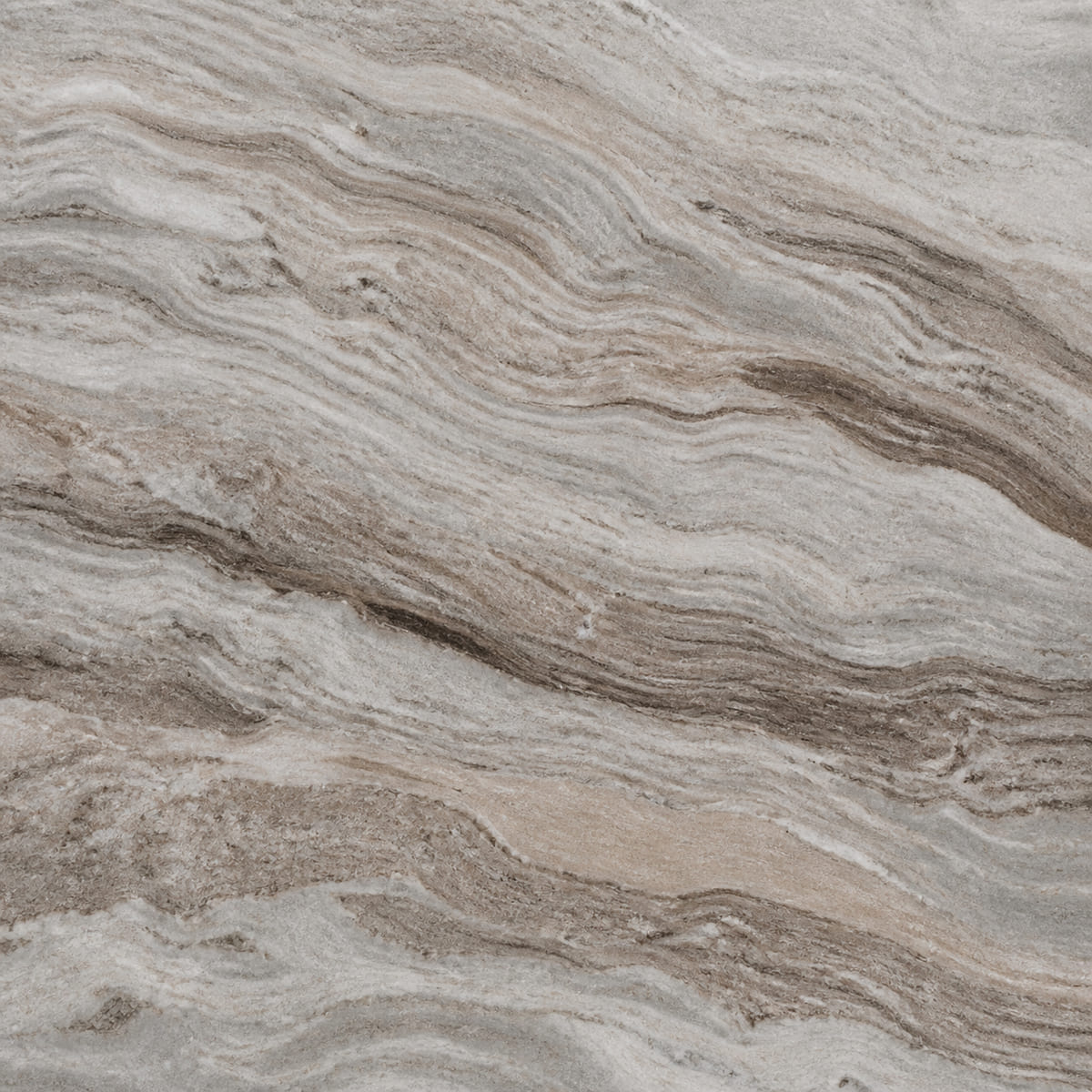 Close-up of a honed Fantasy Brown dolomite countertop with wavy river-like grey, taupe and brown banding