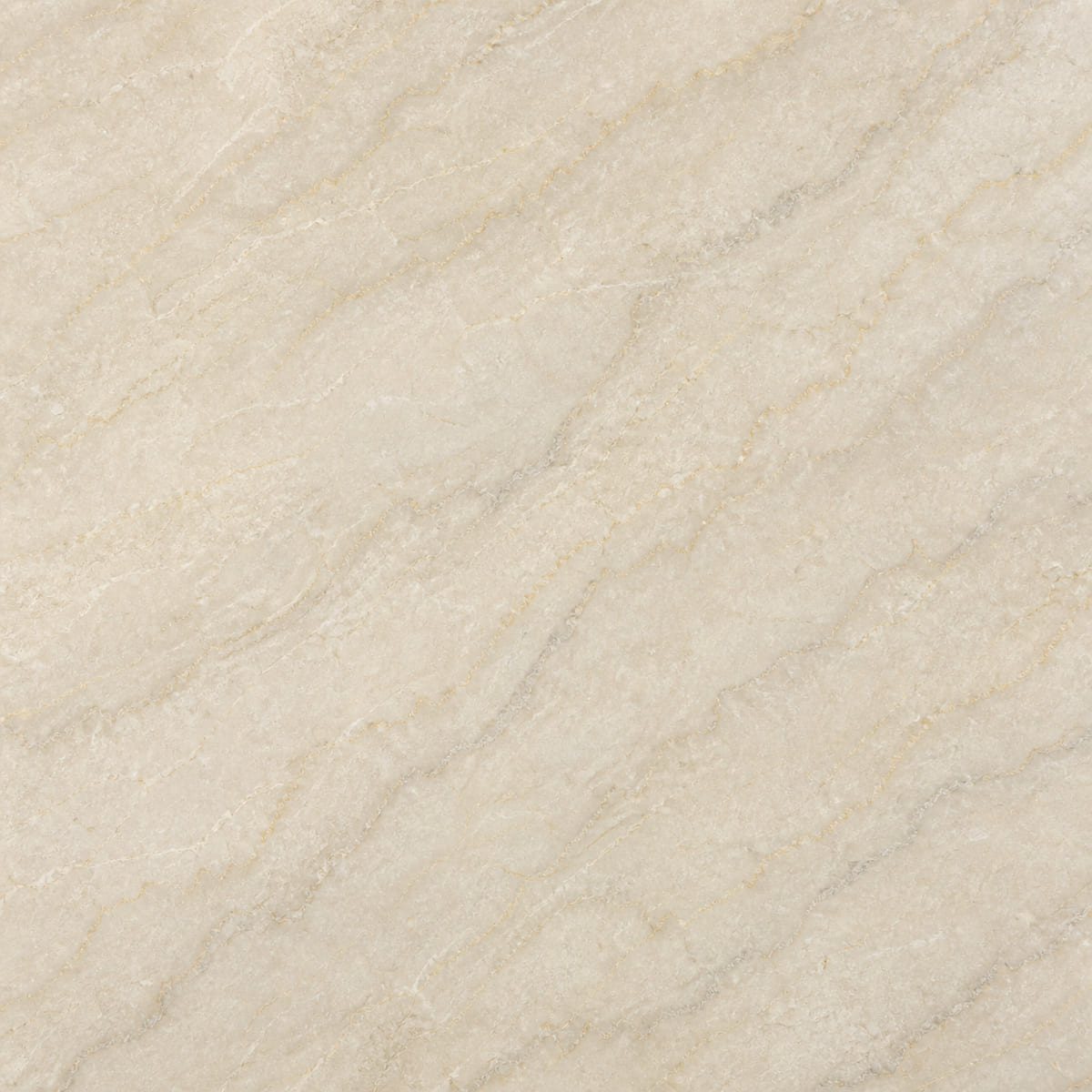 Close-up of a honed Perla Venata dolomite countertop, warm cream with fine soft gold and grey veining