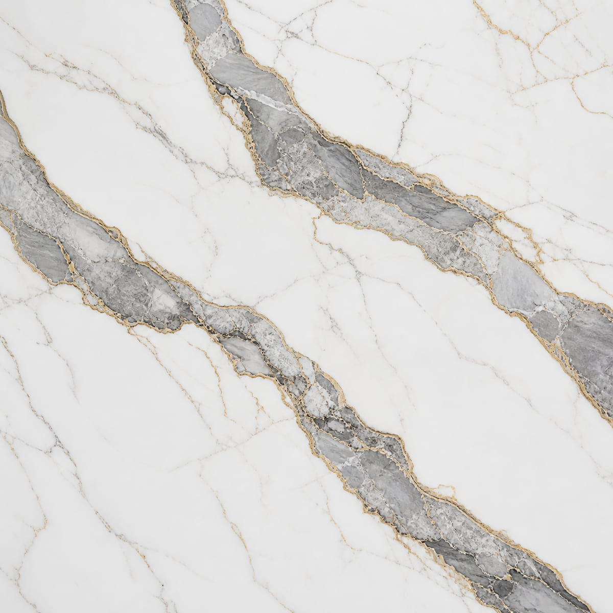 Close-up of a polished white quartz countertop with bold diagonal grey veins outlined in warm gold