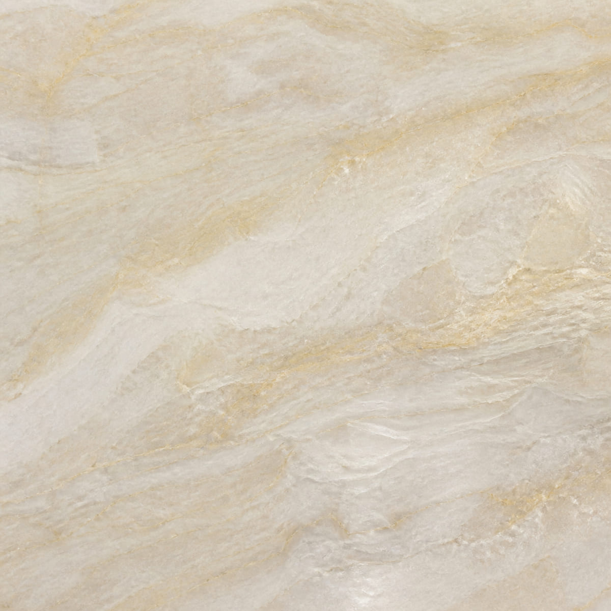 Close-up of a polished cream Taj Mahal quartzite countertop with soft honey-gold and pale grey drifting movement