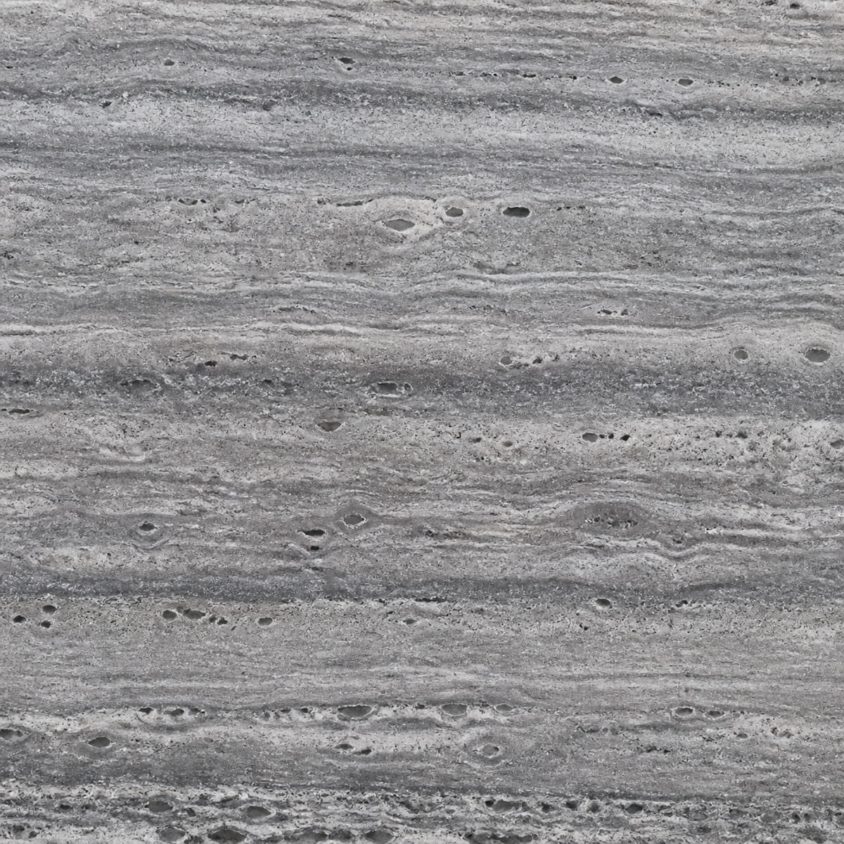 Close-up of a brushed Silver travertine surface, cool grey with strong tightly spaced horizontal striations