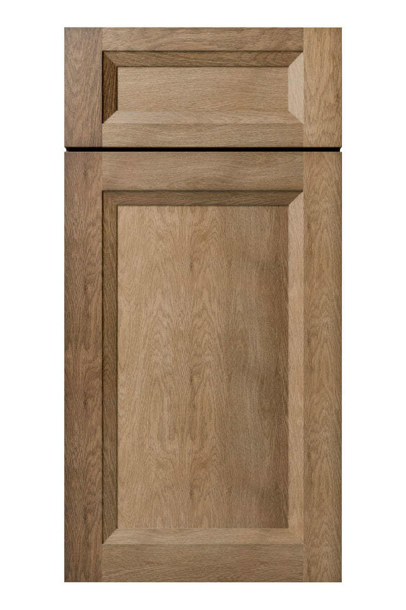 US Cabinet Depot Oxford Toffee cabinet door — a warm tan stain over birch with strong visible grain and a wide bevelled frame