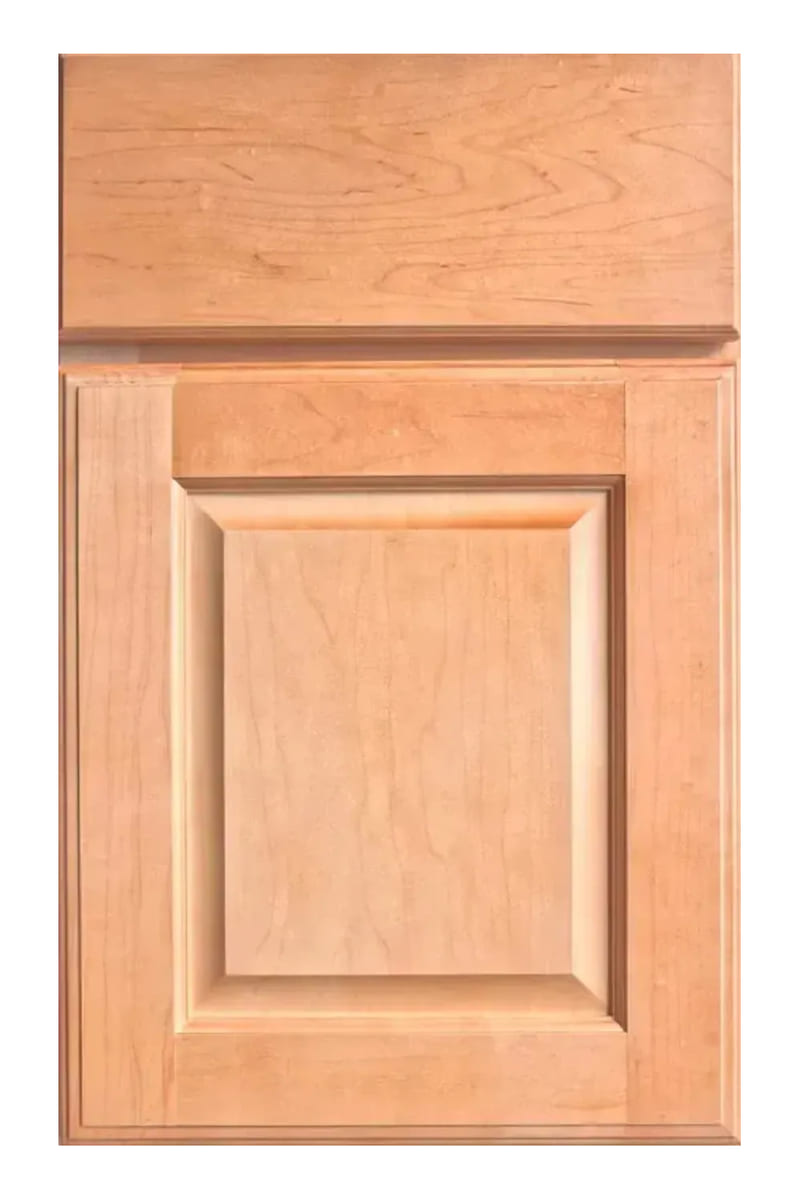 Wellborn Forest Boston Raised Panel cabinet door in maple with a wheat stain — a coved frame around a centre panel that stands proud of the surround