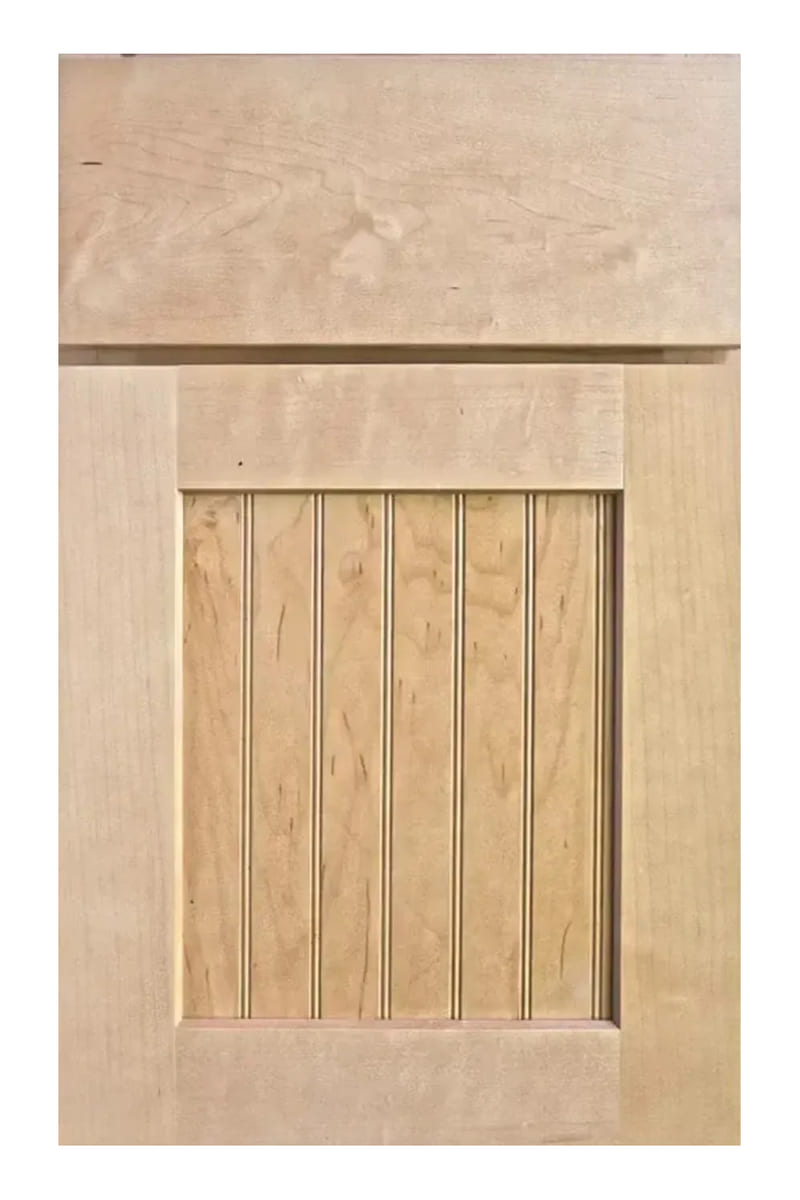 Wellborn Forest Chesapeake cabinet door in maple with a wheat stain — a five-piece door with a vertical beadboard centre panel