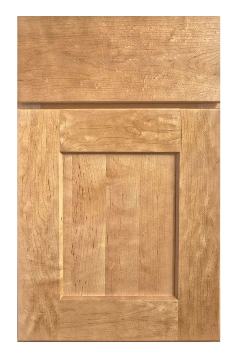Wellborn Forest Hartford cabinet door in maple with a wheat stain — a wide-framed flat panel door with an angled inner bevel